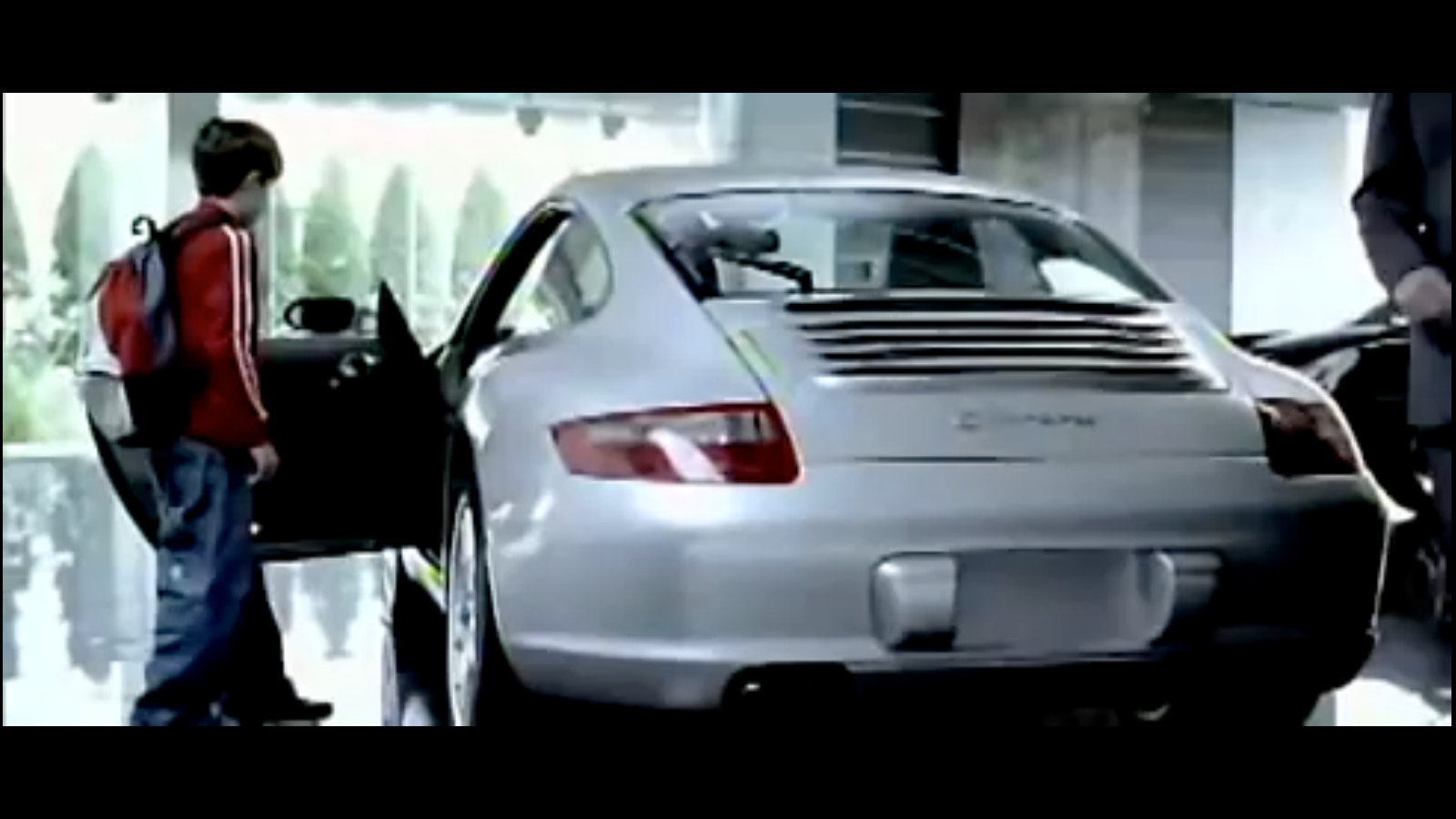The Porsche USA ad: the boy who draws the 911 at school.