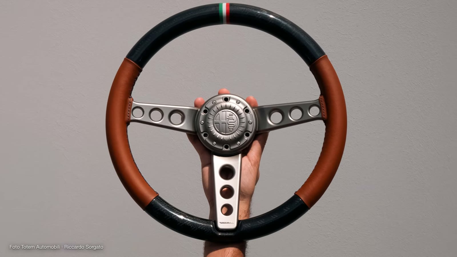 The steering wheel of a Totem GT, shaped to the customer's hand.